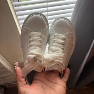 White Sneakers with Red Accents